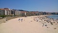 People at urban beach of Silgar in Sanxenxo in Pontevedra Spain