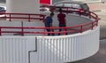 People using foot cross bridge to cross the road. Outdoors