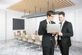 People using laptop in conference room Royalty Free Stock Photo