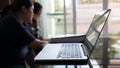 People using laptop working in living room Royalty Free Stock Photo