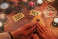 People are using a ouija board Royalty Free Stock Photo