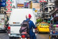 People and vehicles in bangkok city street