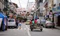 People and vehicles on street at Baclaran in Manila, Philippines Royalty Free Stock Photo