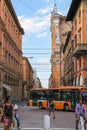 People and vehicles on Via dell'Indipendenza in Bologna, Italy Royalty Free Stock Photo