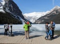 Tourists on banks of Lake Louise, Alberta, Canada Royalty Free Stock Photo