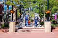 People Viewing Plaques on Pearl Street Mall Sunny Spring Morning