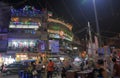 Street market night cityscape New Delhi India