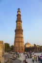 people visit Qutb Minar, Delhi, the worlds tallest brick built minaret