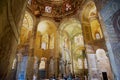 People visit rich decorated Basilica di San Vitale in Ravenna, Italy. Royalty Free Stock Photo