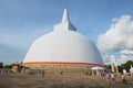 People visit Ruwanwelisaya stupa in Anuradhapura, Sri Lanka .