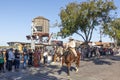 people visit the stockyards train station located in the famous Stockyards and wait for the performance of longhorn cattle drive