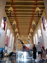 People visit Texas Hall of state building in Fair Park