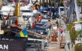 People visit and walk around yachts moored in palma seaport during the 50th Boatshow fair.a de mallorca seaport.