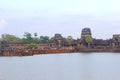 Tourists visiting ancient Angkor Wat sunset, Cambodia