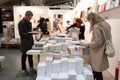 People visiting bookstore at Miart 2014 in Milan Royalty Free Stock Photo