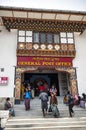 People visiting the busy General Post Office building at capital city Thimpu Royal Govt of Bhutan. Royalty Free Stock Photo