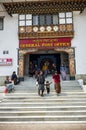 People visiting the busy General Post Office building at capital city Thimpu Royal Govt of Bhutan. Royalty Free Stock Photo