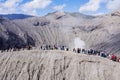 People visiting a crater of Bromo volcano