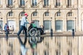 People visiting a mirror fountain in Bordeaux, France Royalty Free Stock Photo