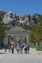 People visiting Mount Rushmore memorial.