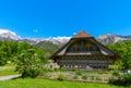 People visiting the old farm house in Ballenberg. Swiss Open Air Museum in Brienz, Switzerland Royalty Free Stock Photo