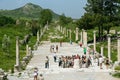 People are visiting promenade near amphitheatre in Ephesus Ancient City in Turkey.