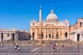 People visiting Saint Peters Basilica in Rome Italy