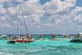 People visiting Stingray city on Gran Cayman in Cayman islands. Stingray city is famous snorkerling spot visited on cruise