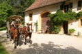 People visiting on tourist buggy old farm houses Royalty Free Stock Photo