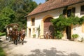 People visiting on tourist buggy old farm houses Royalty Free Stock Photo