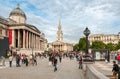 People visiting the Trafalgar Square with the National Gallery and St Martin in the Fields Church in central London Royalty Free Stock Photo