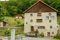 People visiting the village of Heidi over Maienfeld on the Swiss alps