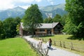 People visiting on walking old farm house in Ballenberg Royalty Free Stock Photo