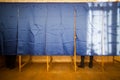 People vote in voting booth Royalty Free Stock Photo