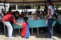 People voting on Venezuelan national consultation called by the National Assembly