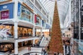 People Wadering around the Interior of a Shopping Centre Decorate for Christmas Royalty Free Stock Photo