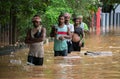 People wades water on a waterlogged road after heavy rainfall, on October 6, 2023 in Guwahati, Assam, India. Severe water logging 