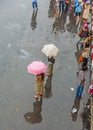 People wait for the bus at Chatuchak weekend market in rain Royalty Free Stock Photo