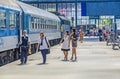 People wait in the famous West Train Station in Budapest