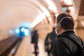 People wait at a subway station in Kiev.