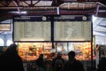 People wait for the train in the Northern Railway Station Gara de Nord during a cold, sunny and snowy day in Bucharest Royalty Free Stock Photo