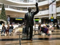 People waiting in arivals terminal at O R Tambo international airport with Oliver Tambo Royalty Free Stock Photo