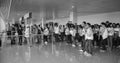 People waiting for boarding at Tan Son Nhat airport in Saigon, Vietnam Royalty Free Stock Photo