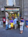 People waiting at fruit juice stall