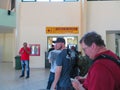 People waiting in  line at the Holguin Airport to exchange their currency Royalty Free Stock Photo