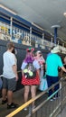 People waiting in line to get on the Monorail in Magic Kingdom