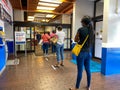 People waiting in line at a United States Post Office