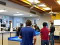 People waiting in line at a United States Post Office