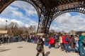 People Waiting in Long Queue at Eiffel Tower in Paris France