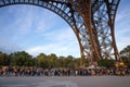 People waiting in long queue at Eiffel Tower in Paris, France. Royalty Free Stock Photo